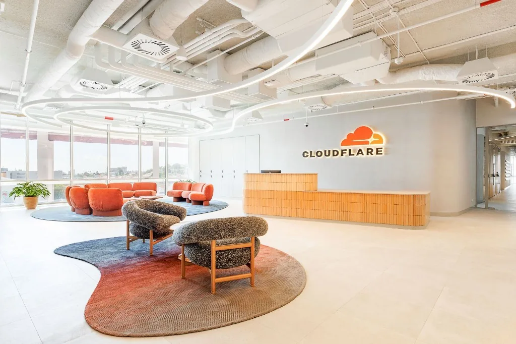 Cloudflare office lobby with reception desk and lounge seating
